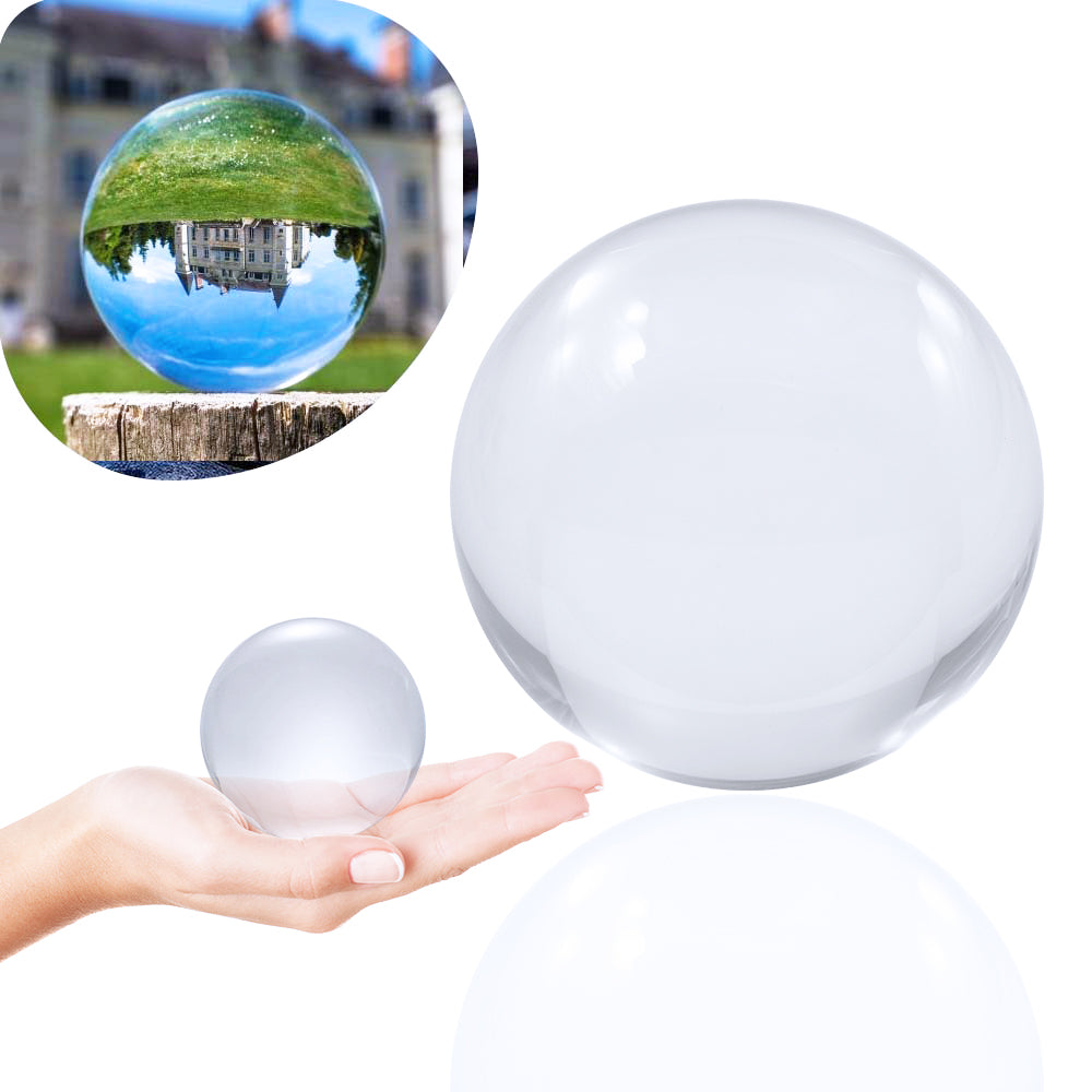 70mm Clear Contact Juggling Ball; Contact Ball lying in Hand; Inverted panorama of castle in reflection of ball