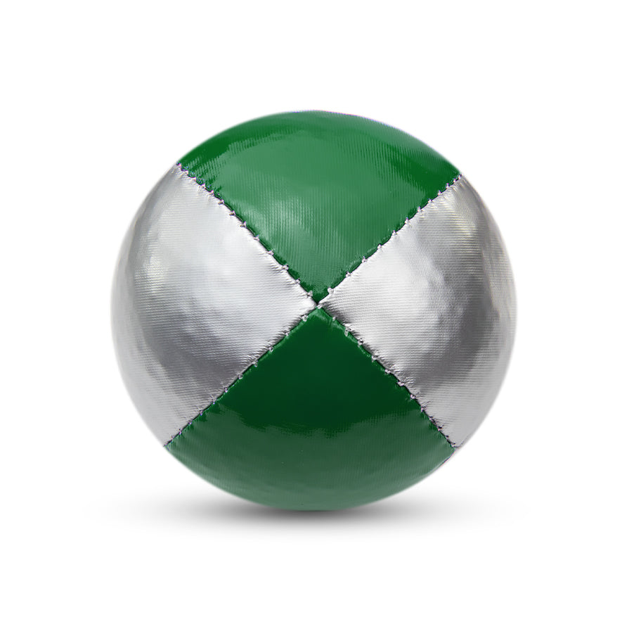 A silver and green Juggle Dream 120g juggling ball