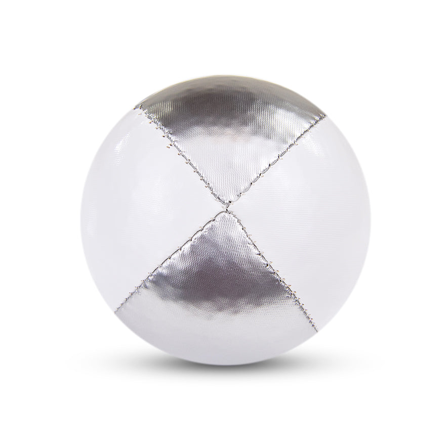 A silver and white Juggle Dream 120g thud juggling ball