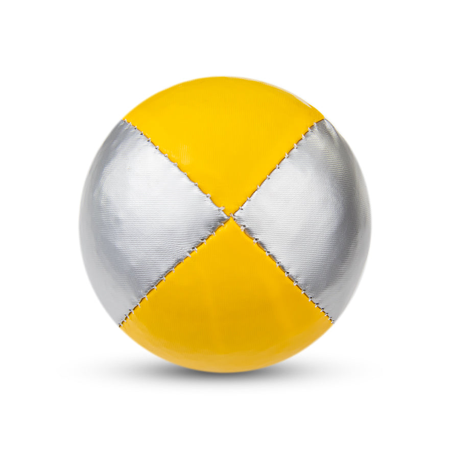 A silver and yellow Juggle Dream 120g juggling ball
