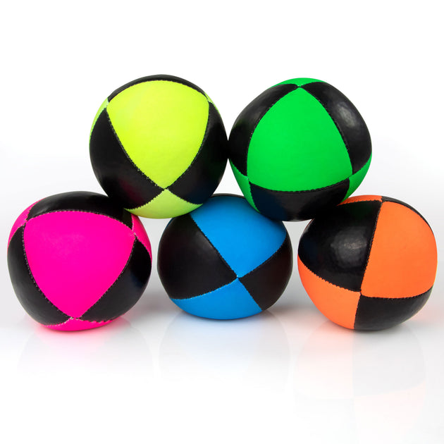 Two juggling balls on top of three juggling balls from front