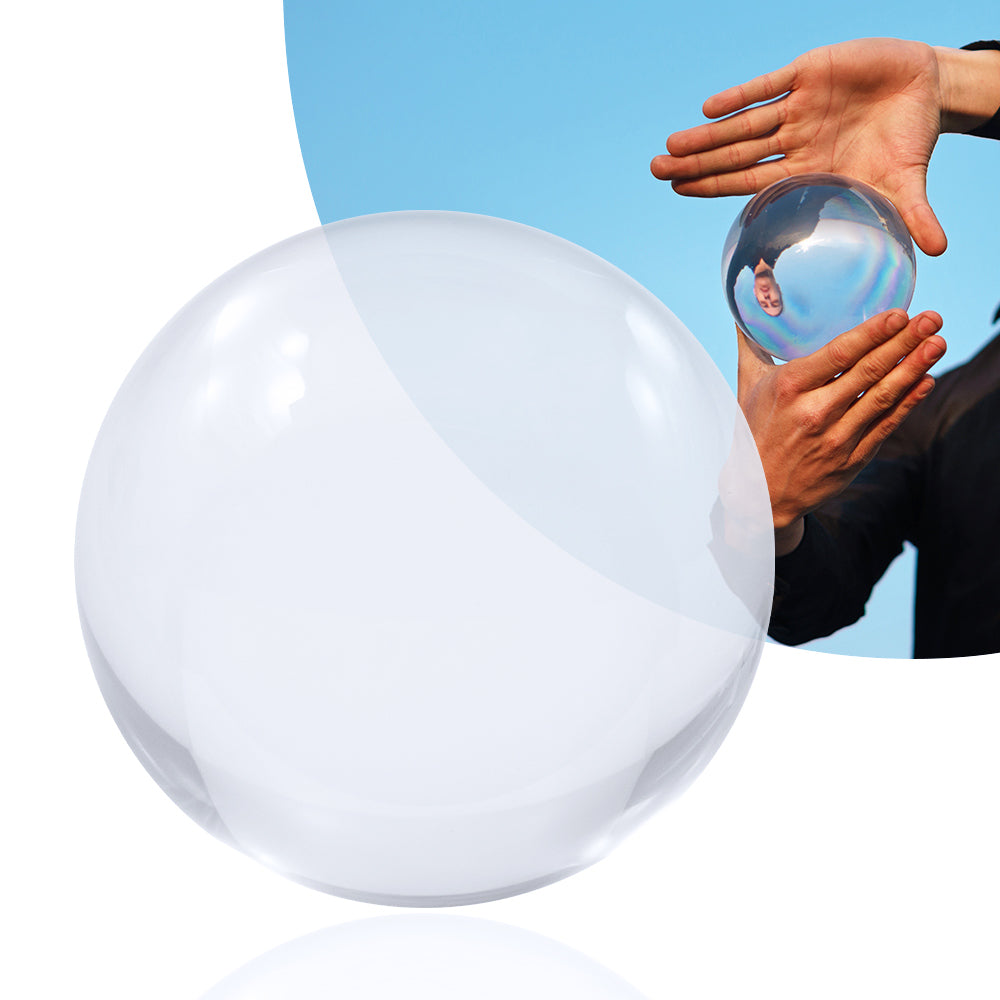 120mm Clear Contact Juggling Ball; Guy balances with glass ball; Inverted panorama of sky in reflection of ball