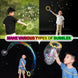 Boy playing with bubble kit making various types of bubbles: small bubbles and big bubbles