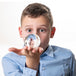 Boy holding an acrylic contact ball in hand