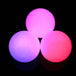 Three 95mm Oddballs LED Contact Balls glowing in pink colour