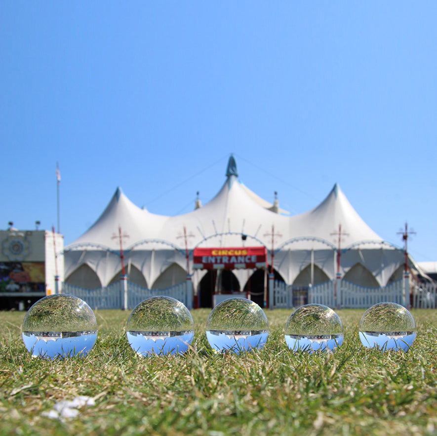 All sizes Juggle Dream Crystal Clear Contact Juggling Balls on the grass in circus tent background