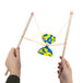 Playing Diabolo with Hands holding Wooden Sticks 