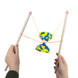 Playing Diabolo with Hands holding Wooden Sticks 
