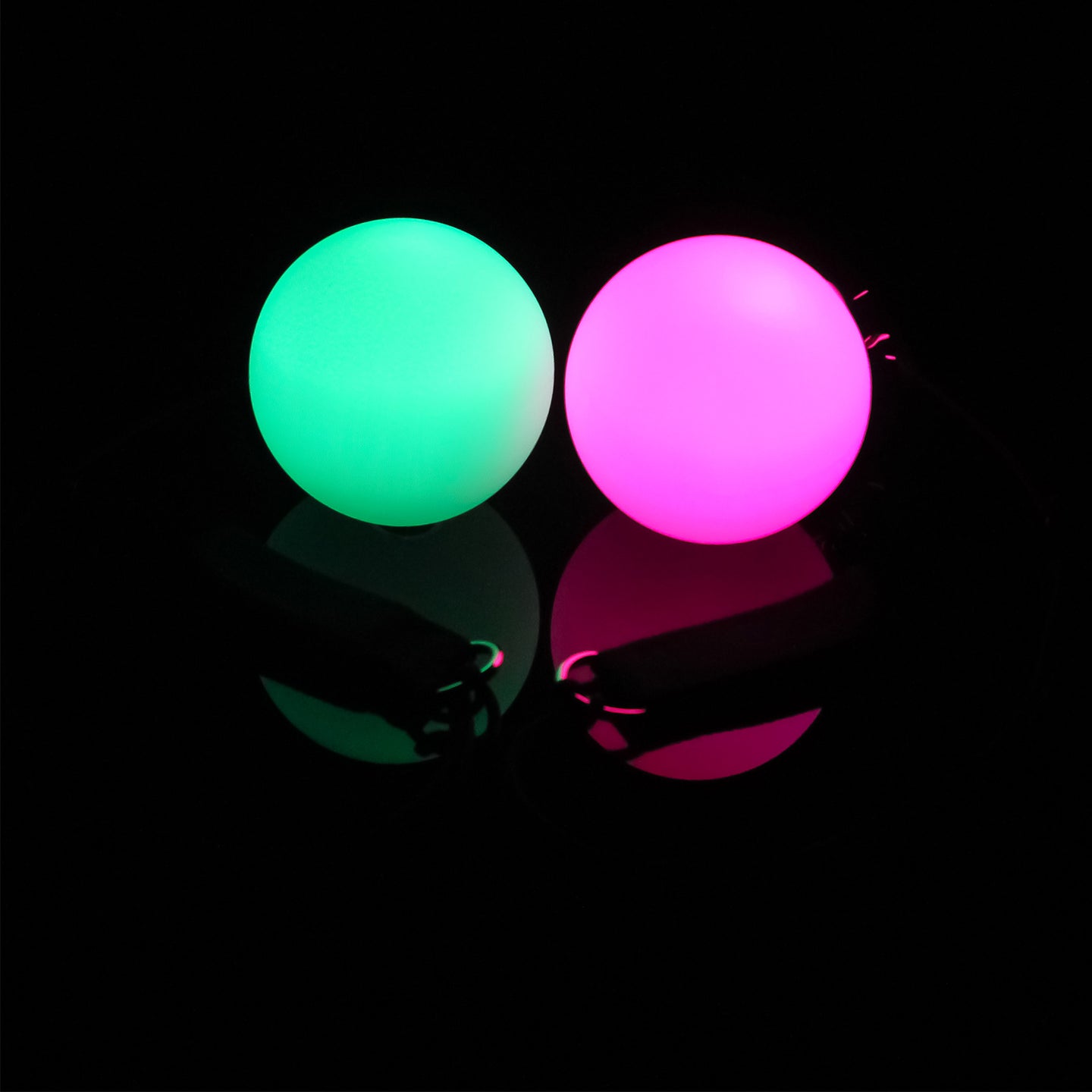 Glowing in Pink and Mint Soft Fade LED Poi in black background
