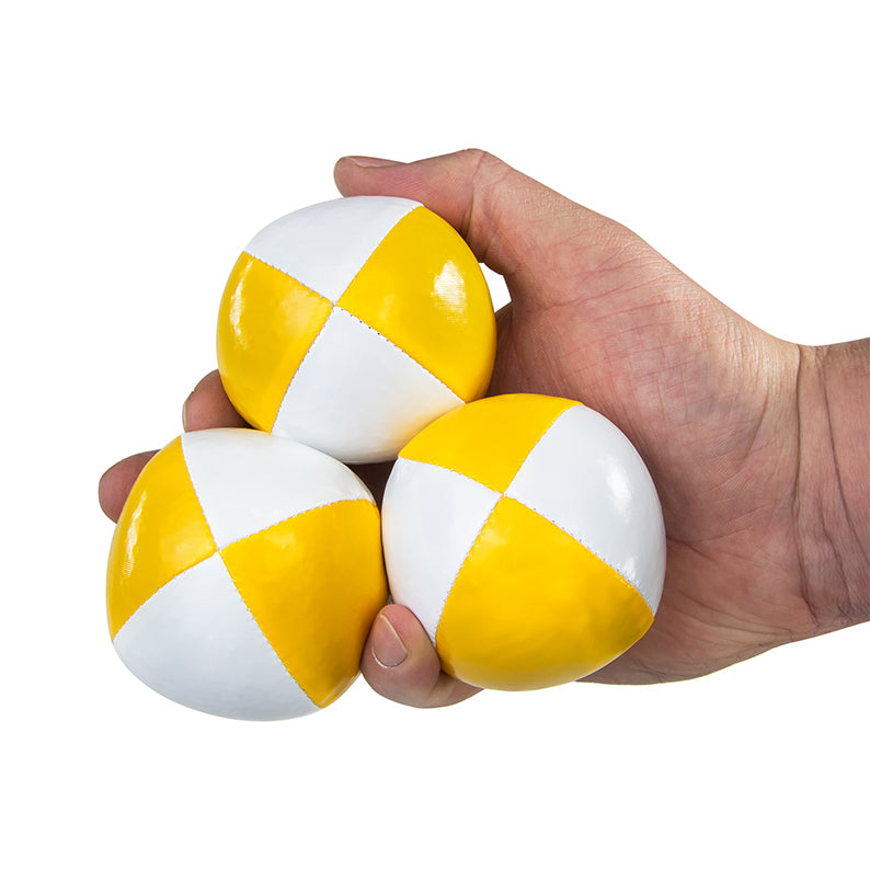 Three juggling balls in hand