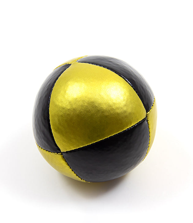 Black and golden 8-panel Squeeze Juggling Ball