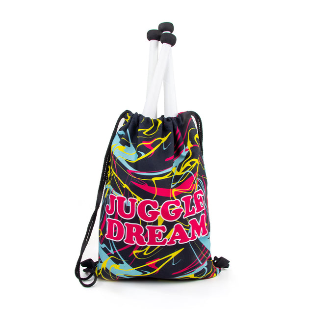 Juggle Dream drawstring bag with three juggling clubs inside