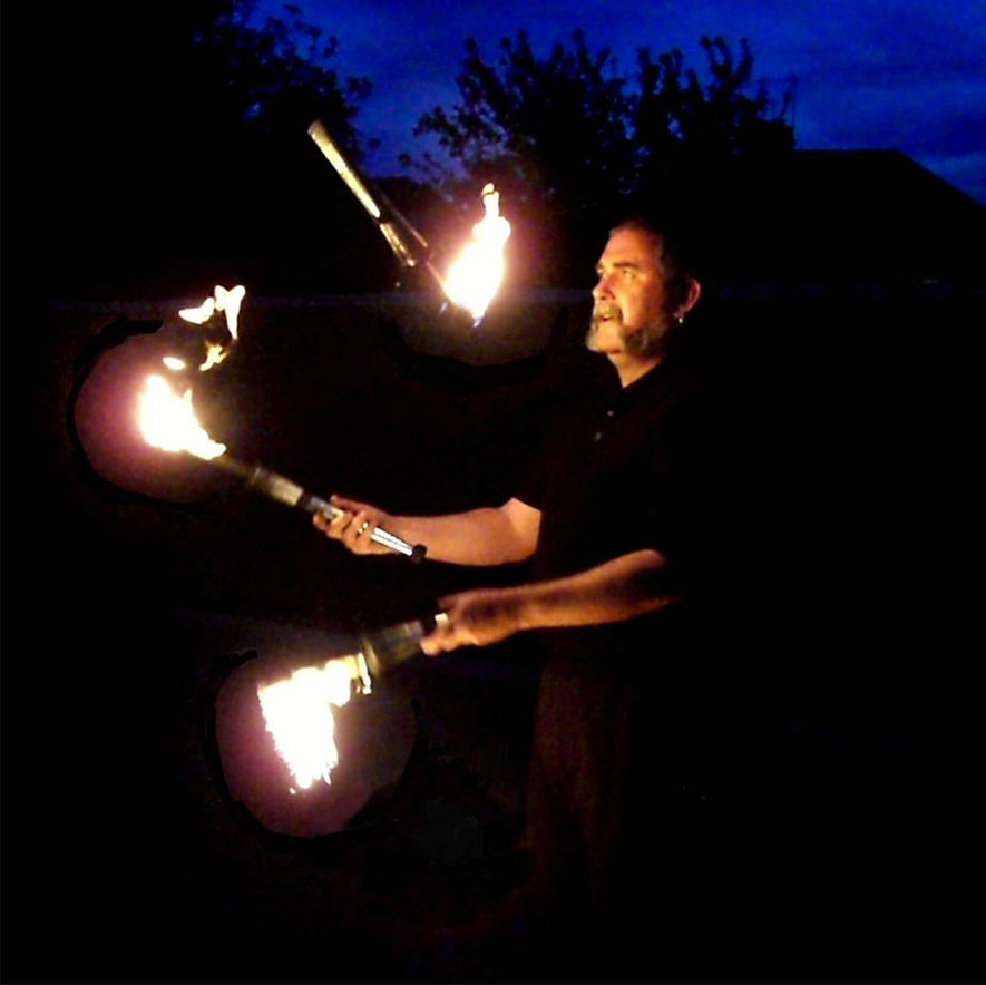 Men juggling with Fire Torches
