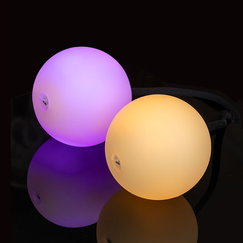 Two 95 mm LED Contact Pois glowing in orange and purple