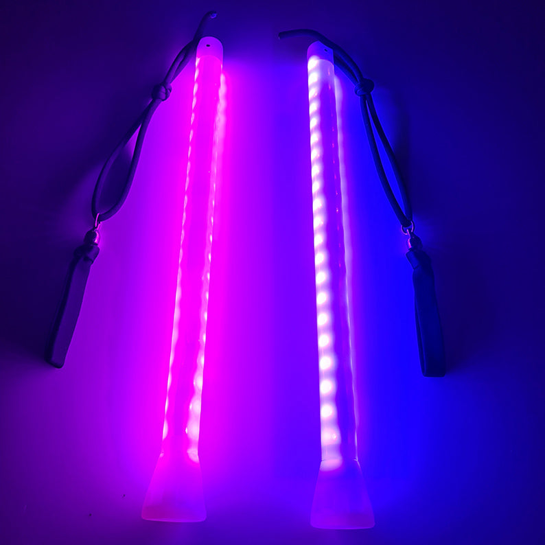 PoiStix Pro glowing in the dark with pink and purple colours