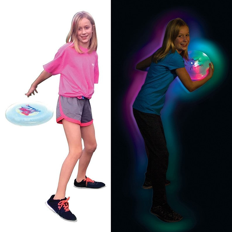 Girl playing Duncan Blaze Light-Up Disc in day light and in the dark
