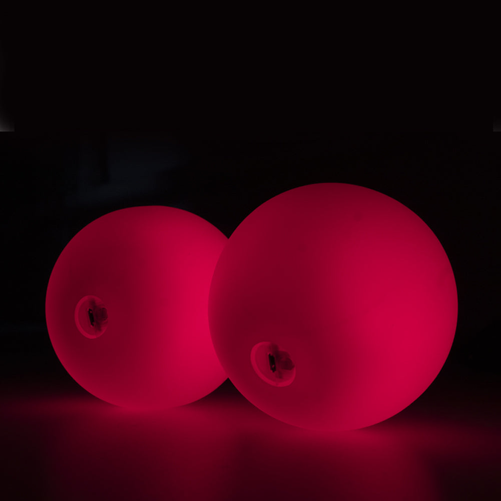 Two 95 mm LED Contact Pois glowing in pink