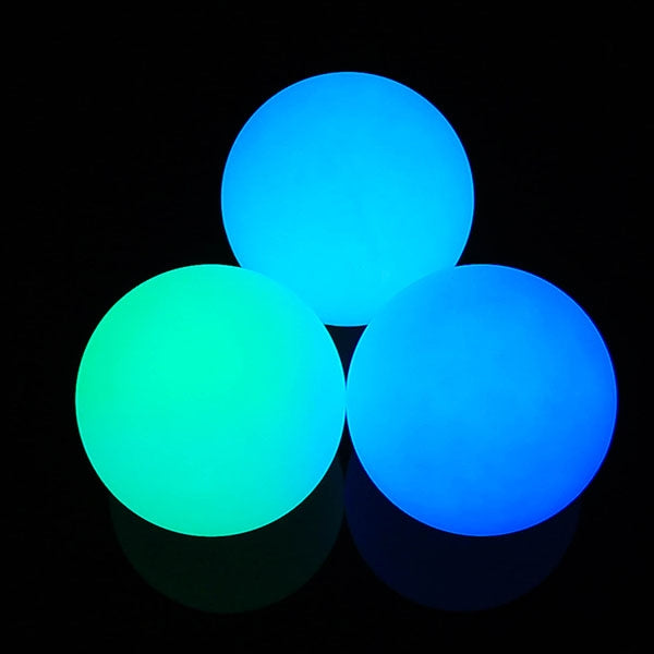 Three 95mm Oddballs LED Contact Balls glowing in blue colour