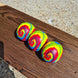 3 Festival Tye Dye Swirls in natural background lightened by sun