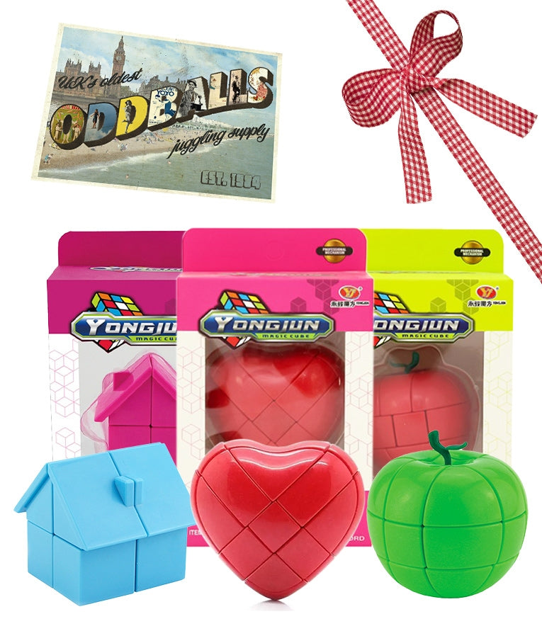 Small House 2 x 2 x 2 Puzzle, Heart 3 x 3 x 3 Cube Style Puzzle, Apple 3 x 3 x 3 Cube Style Puzzle and Oddballs Postcard